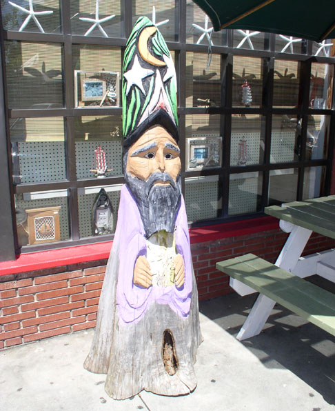 Carved Wizard In Front Of The Old Time Soda Fountain Shop In Apalachicola, Florida