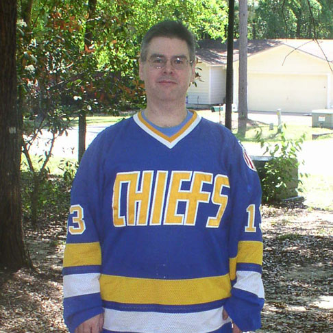 Carl Wearing A Charlestown Chiefs Jersey