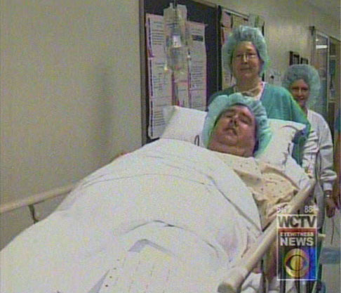 Carl being wheeled into surgery on March 2, 2006